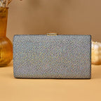 Black and white patterned clutch bag on a beige background