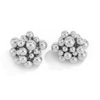 Pair of silver bead earrings on a white background