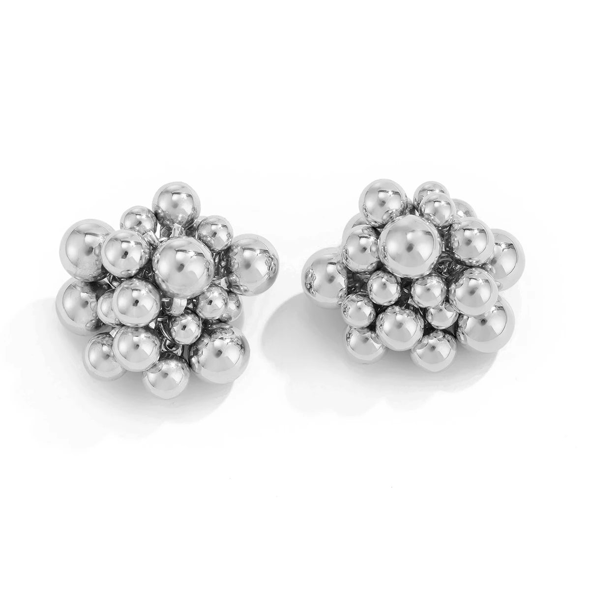 Pair of silver bead earrings on a white background