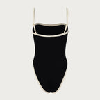 Black swimsuit with thin straps on a light gray background