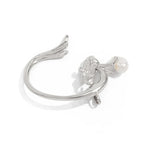 Silver earring with a pearl on a white background