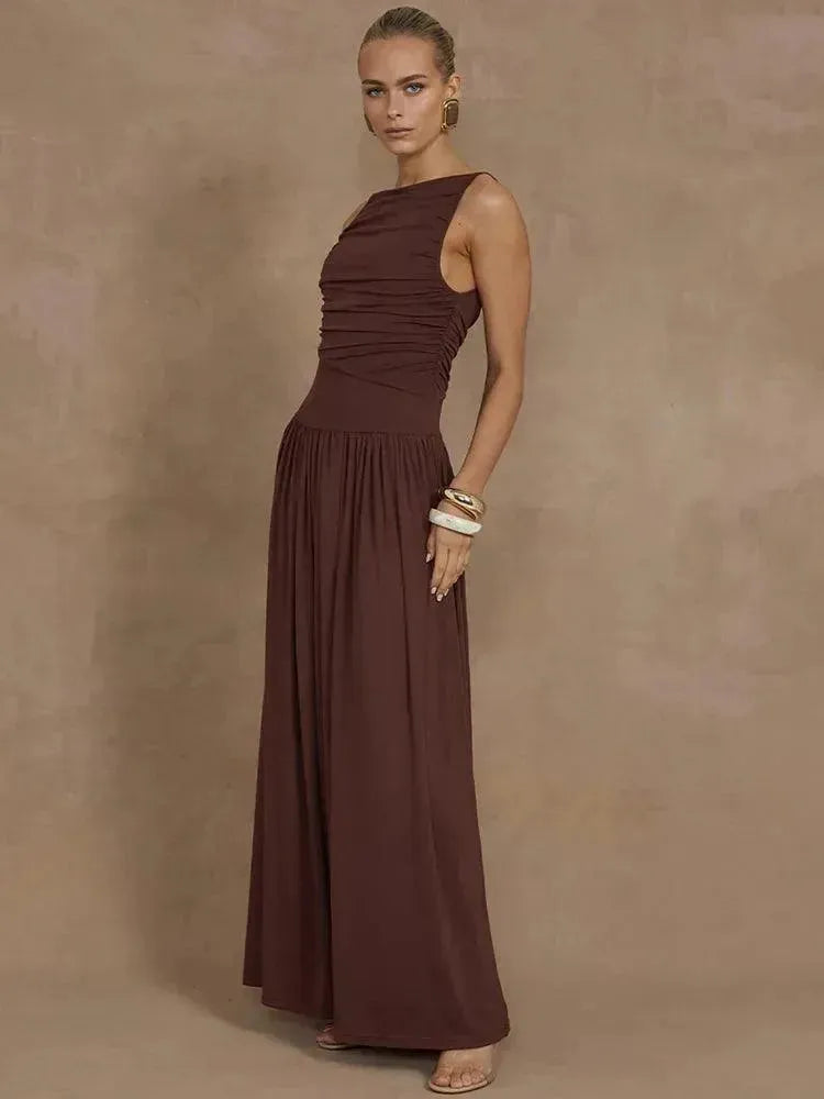 Woman wearing a brown dress against a brown background