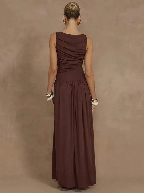 Woman wearing a brown dress against a brown background