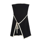 A black strapless mini dress with a solid backless design above knee, featuring a black belt.
