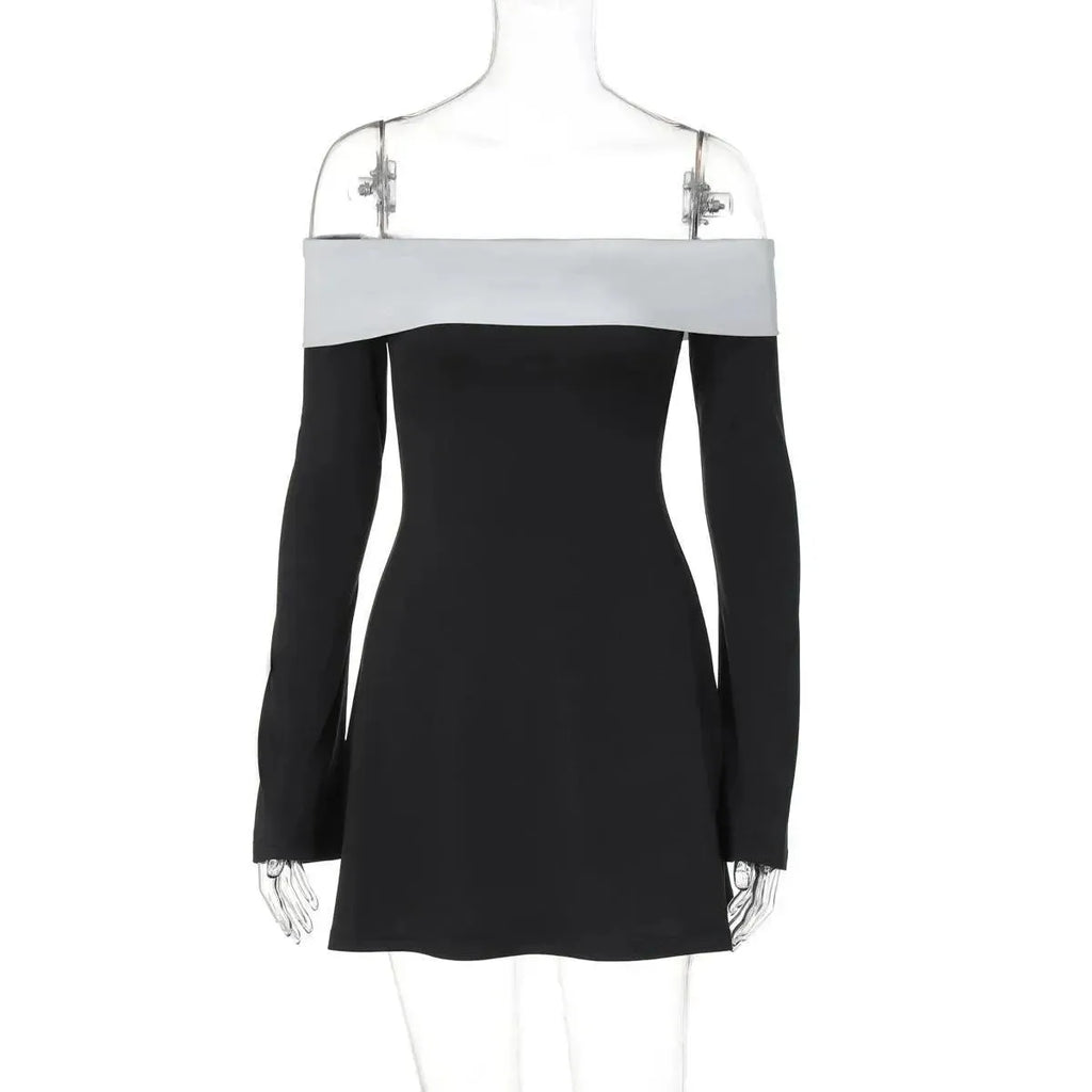 Black and white dress on a mannequin against a white background