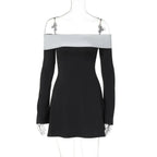 Black and white dress on a mannequin against a white background