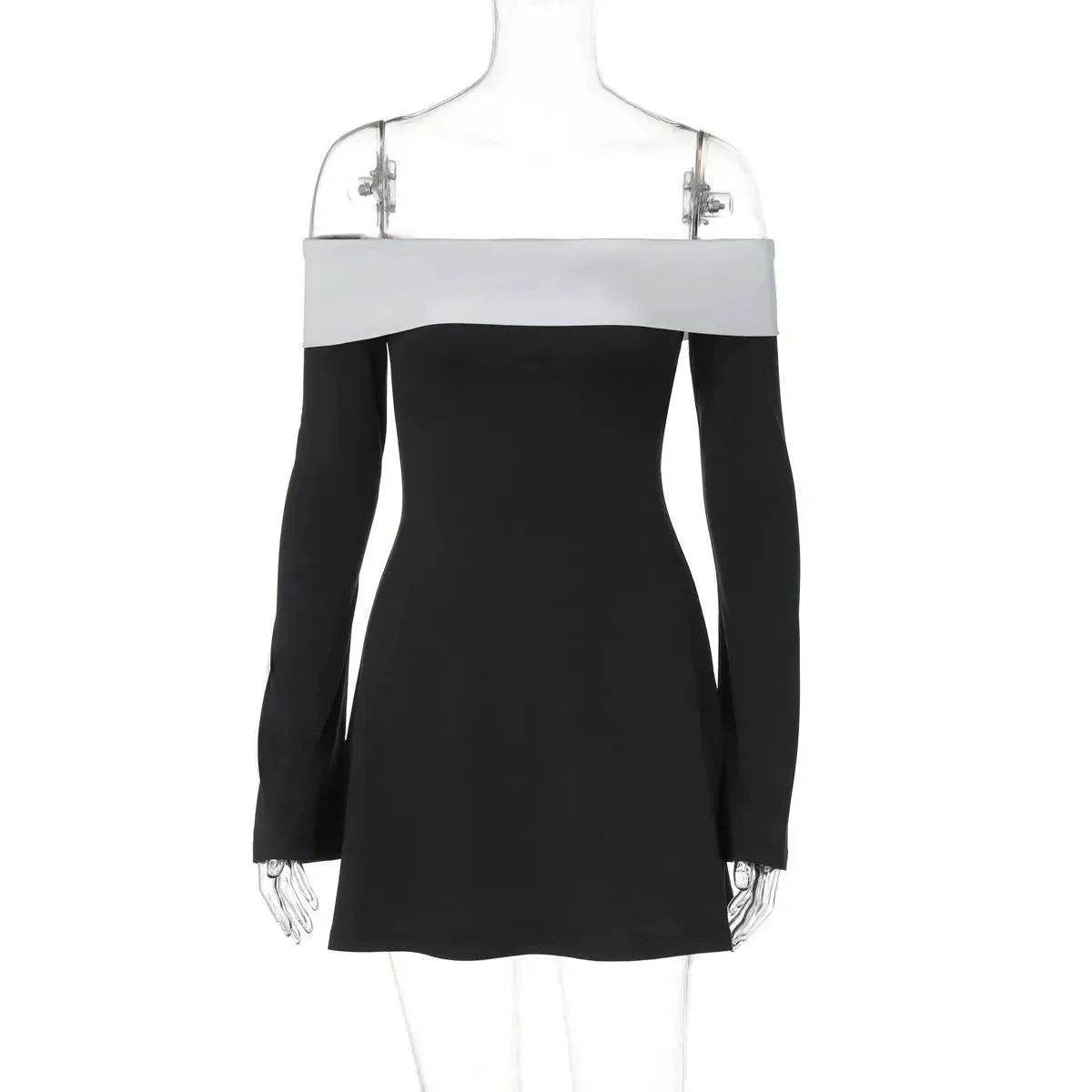 Black and white dress on a mannequin against a white background