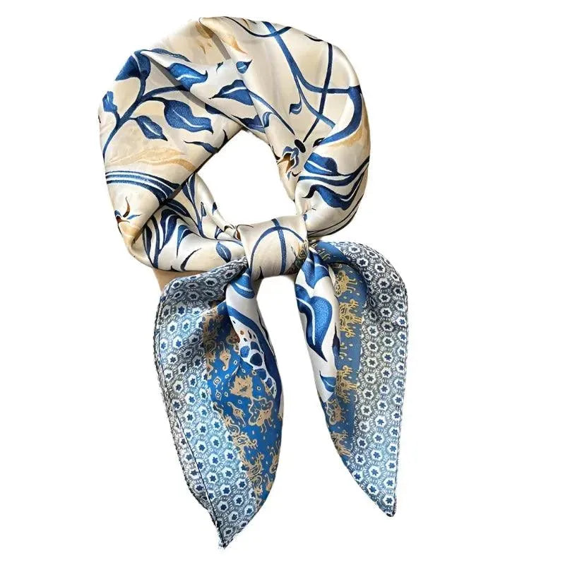 A multicolored floral patterned silk headband scarf.