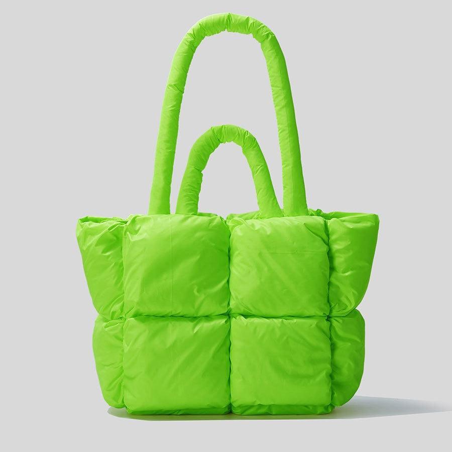 A bright green, fluorescent padded handbag with a solid pattern and a shoulder strap.